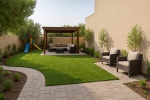 حديقة منزلية في الروضة مقسمة لجلسة ومكان لعب وممر حجري